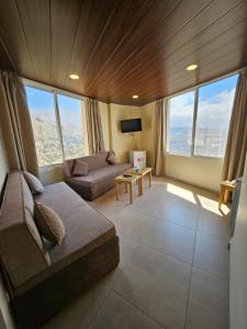 Posezení v ubytování Hotel L'Aiglon