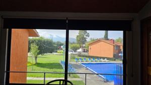 Piscina en o cerca de Villa 25 La Rinconada Tequisquiapan