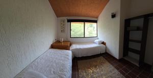 Cama o camas de una habitación en Villa 25 La Rinconada Tequisquiapan
