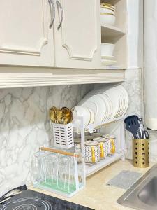 Η κουζίνα ή μικρή κουζίνα στο Vintage-Style Home in Burnham Baguio