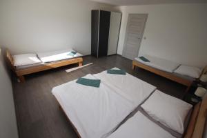 Posteľ alebo postele v izbe v ubytovaní Apartmán u Trojmezí