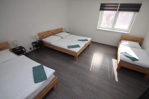 Posteľ alebo postele v izbe v ubytovaní Apartmán u Trojmezí