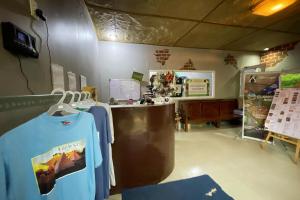 a shop with a shirt hanging on the wall at Viewscape Nature Park Tanay powered by Cocotel in Tanay