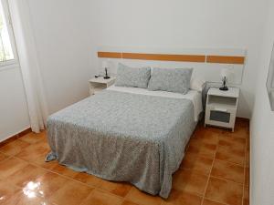 Posteľ alebo postele v izbe v ubytovaní Chalet Mari Carmen