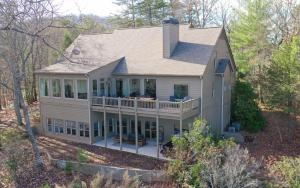 an aerial view of a house with a porch at McElroy Manor - Luxury and comfort in Big Canoe in Jasper