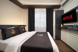 Postel nebo postele na pokoji v ubytování Bakırköy Zeugma Suit Otel