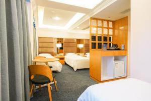 Letto o letti in una camera di Warwick Hotel Cheung Chau