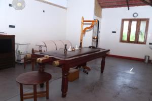 a room with a table and chairs in a room at Tapasya Health & Wellness in Jaisingpur +12 photos