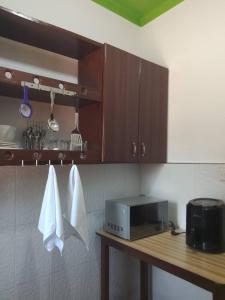 Kuchyň nebo kuchyňský kout v ubytování Palm Suites
