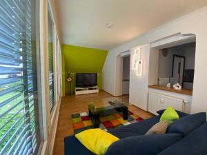Posezení v ubytování Ferienwohnung- Südsteirischer Traum