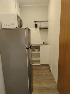 Kuchyňa alebo kuchynka v ubytovaní Elli apartament