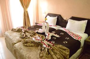 Postel nebo postele na pokoji v ubytování Diwane Hotel & Spa Marrakech