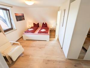 Postel nebo postele na pokoji v ubytování B5 Urlaubsmagie Gemütliche Wohnung inmitten der Sächsischen Schweiz