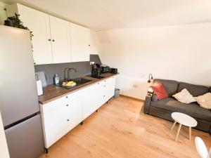 Kuchyň nebo kuchyňský kout v ubytování B5 Urlaubsmagie Gemütliche Wohnung inmitten der Sächsischen Schweiz