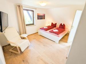 Postel nebo postele na pokoji v ubytování B5 Urlaubsmagie Gemütliche Wohnung inmitten der Sächsischen Schweiz