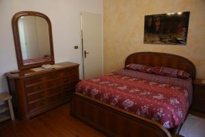 Postel nebo postele na pokoji v ubytování B&B All'Antica Fonte