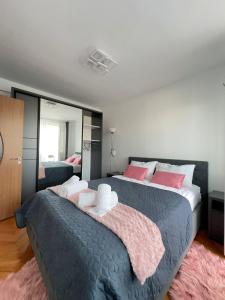 Katil atau katil-katil dalam bilik di Apartament Andrei