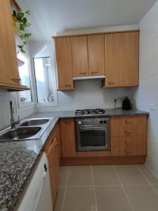 Η κουζίνα ή μικρή κουζίνα στο Peral 32 - Baix amb Pàrquing