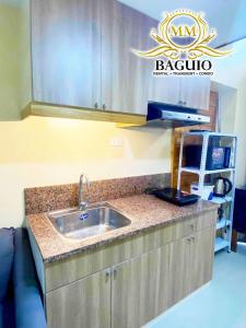 Dapur atau dapur kecil di MM Summer PINES RESIDENCE +7 gambar