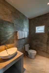Koupelna v ubytování A Hotel Cozy