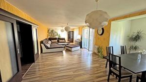Posezení v ubytování Lipno Apartments Exclusive + 7 fotografií