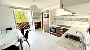 Kuchyň nebo kuchyňský kout v ubytování Lipno Apartments Exclusive