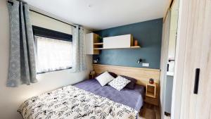Posteľ alebo postele v izbe v ubytovaní Camping Officiel Siblu Les Oyats