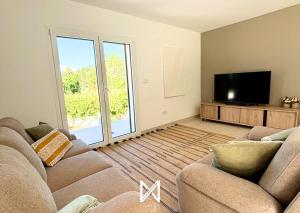 TV a/nebo společenská místnost v ubytování MyStay - Encosta da Barragem