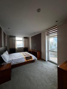 Postel nebo postele na pokoji v ubytování Zuut hotel