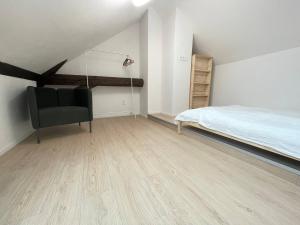 Posteľ alebo postele v izbe v ubytovaní Hotel Vinařice Česky kras