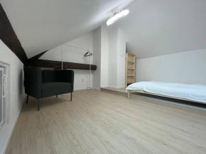 Posteľ alebo postele v izbe v ubytovaní Hotel Vinařice Česky kras