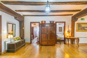 Postel nebo postele na pokoji v ubytování Casa rural Arotzenia, hogar rústico en pleno valle de la Ulzama