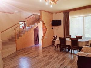 TV a/nebo společenská místnost v ubytování Paradise Guest House + 14 fotografií