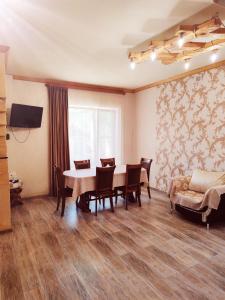 TV a/nebo společenská místnost v ubytování Paradise Guest House