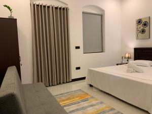 Voodi või voodid majutusasutuse Leena Holiday Home toas