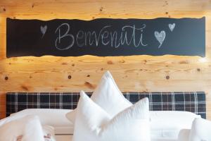 A bed or beds in a room at Bio Boutique Hotel Laurino
