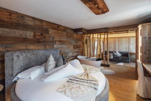 A bed or beds in a room at Bio Boutique Hotel Laurino