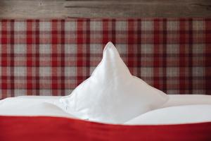 A bed or beds in a room at Bio Boutique Hotel Laurino