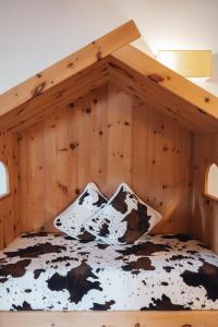 A bed or beds in a room at Bio Boutique Hotel Laurino