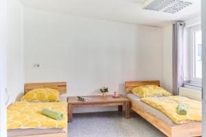 Postel nebo postele na pokoji v ubytování Schwanthaler Hof