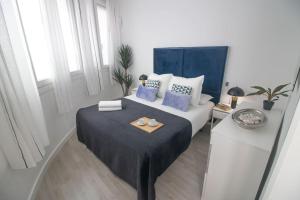 Ένα ή περισσότερα κρεβάτια σε δωμάτιο στο Trinidad Aparment