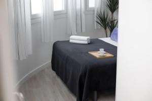 Ένα ή περισσότερα κρεβάτια σε δωμάτιο στο Trinidad Aparment