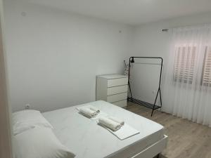Postel nebo postele na pokoji v ubytování Guest house Ivan