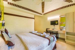 TV a/nebo společenská místnost v ubytování Vihar Holiday Resorts