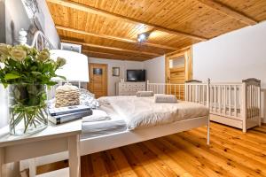 Łóżko lub łóżka w pokoju w obiekcie Hanna House