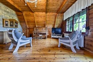 Telewizja i/lub zestaw kina domowego w obiekcie Hanna House