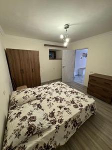 Postel nebo postele na pokoji v ubytování Nune's home