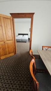 Posteľ alebo postele v izbe v ubytovaní Apartmány LAGUNA