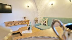 TV a/nebo společenská místnost v ubytování Familien- und Apartmenthotel Lerchenberghof