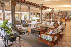 Гостиная зона в Dinarobin Beachcomber Golf Resort & Spa